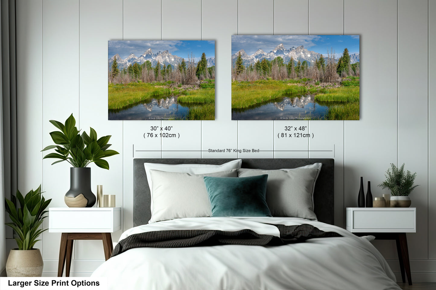 a bedroom with a bed and two pictures on the wall