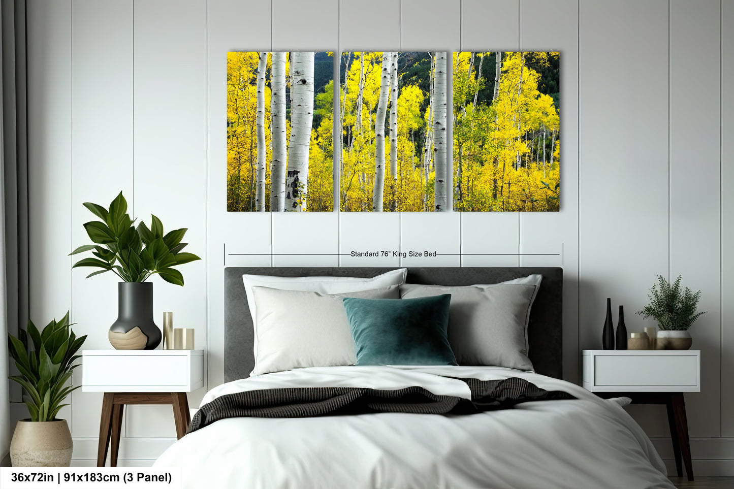 a bed room with a neatly made bed and a painting on the wall