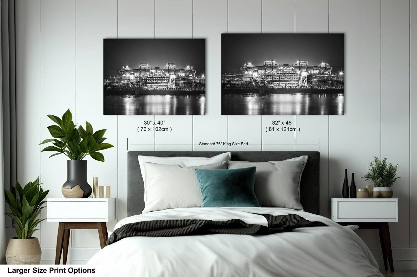a bedroom with a bed and two pictures on the wall