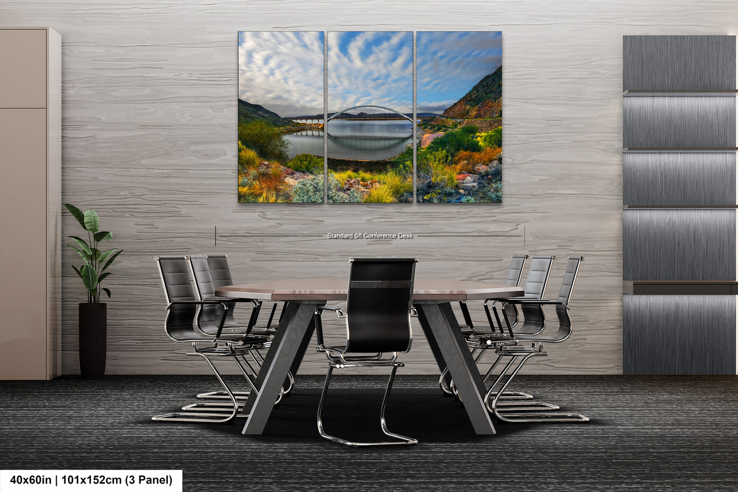 a dining room table with chairs and a painting on the wall