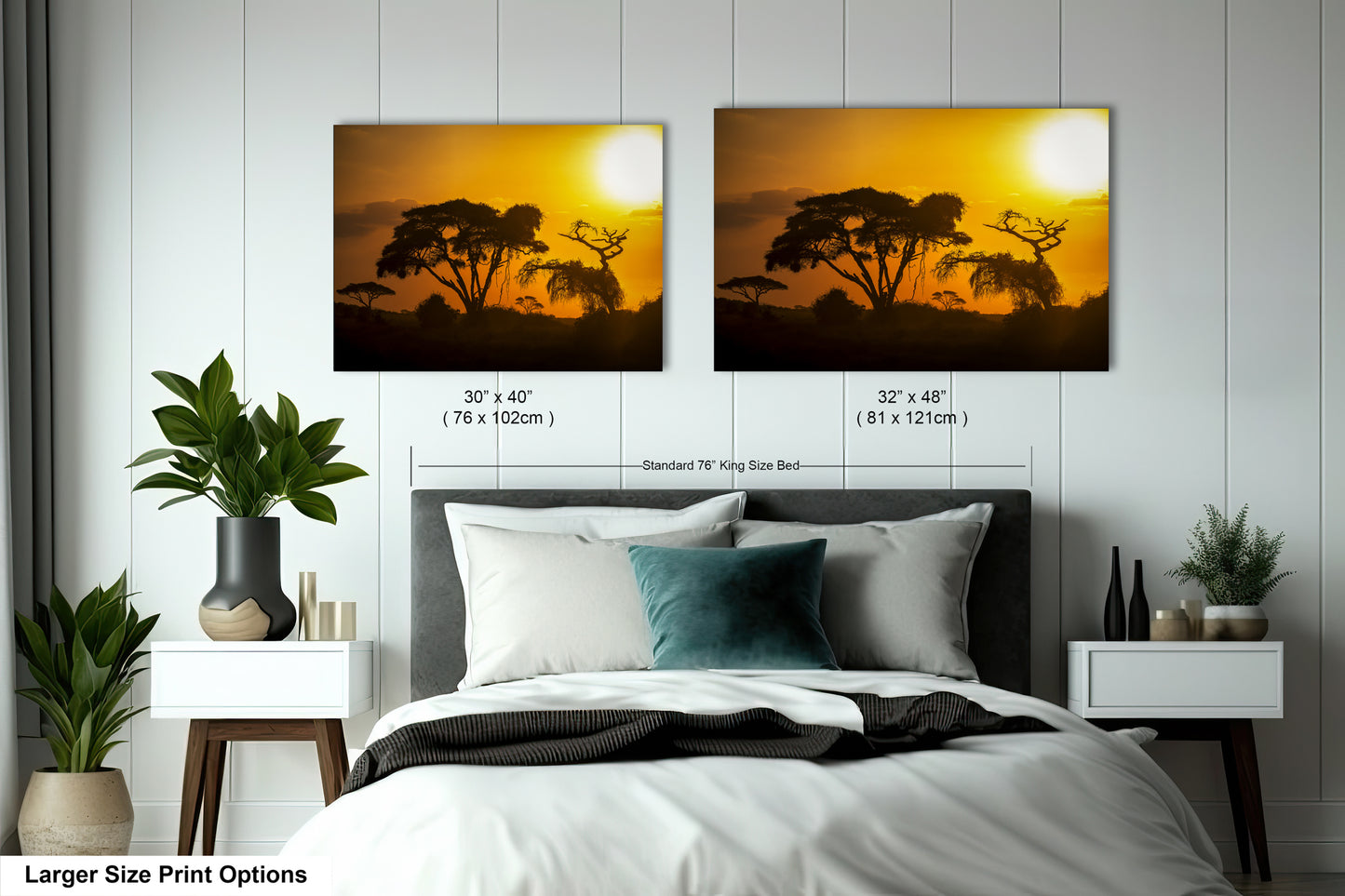 a bedroom with a bed and two pictures on the wall