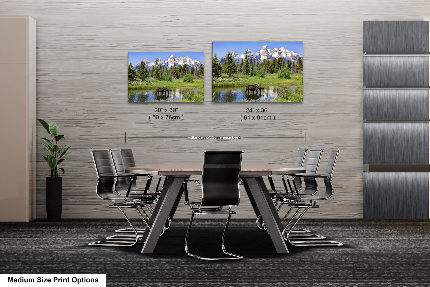 a dining room table with chairs next to a wall with pictures of mountains