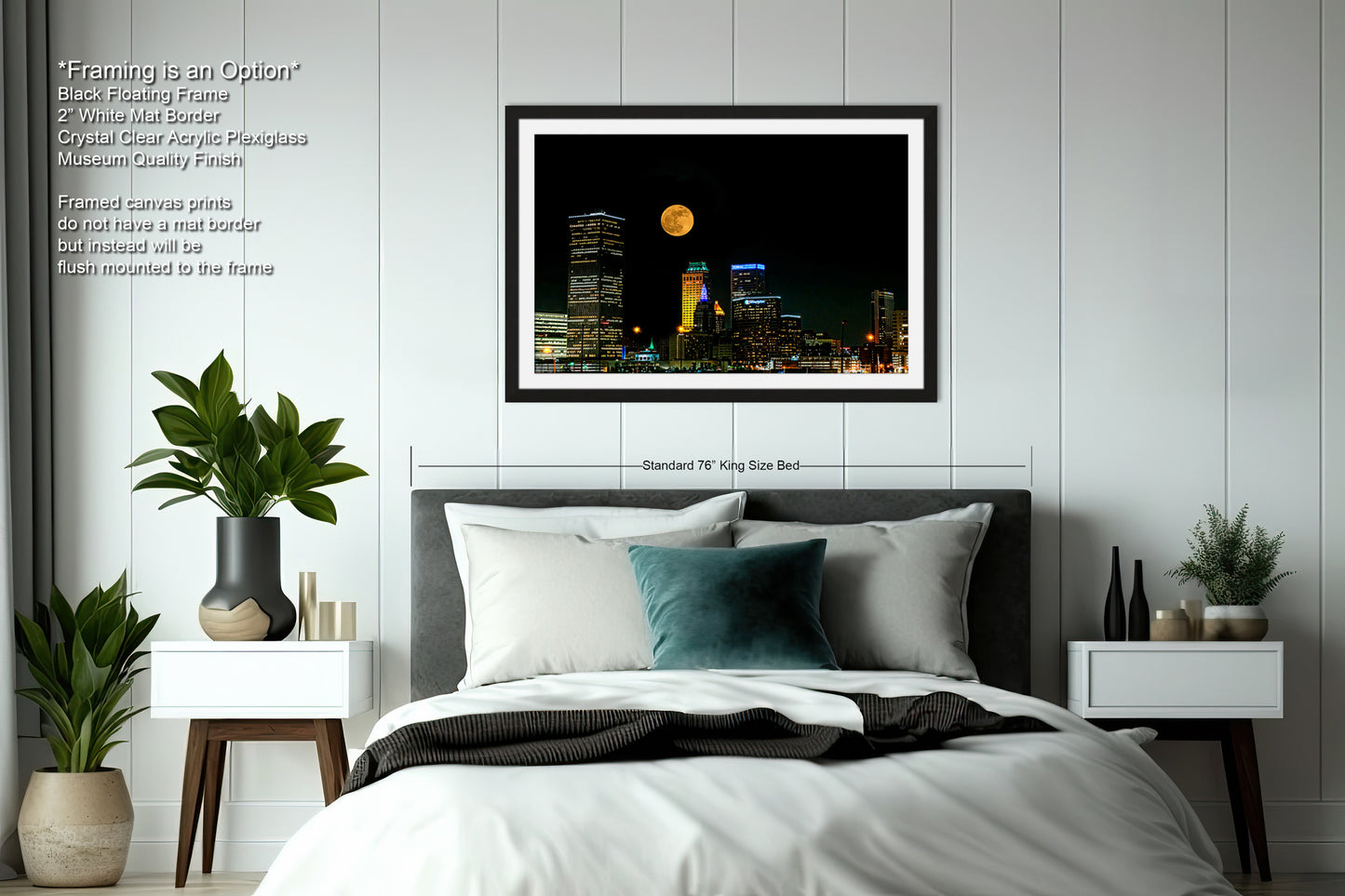 a picture of a bed with a city skyline in the background