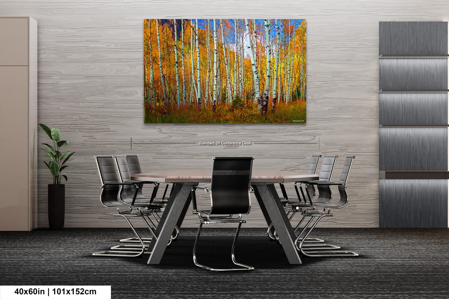 a dining room table with chairs and a painting on the wall