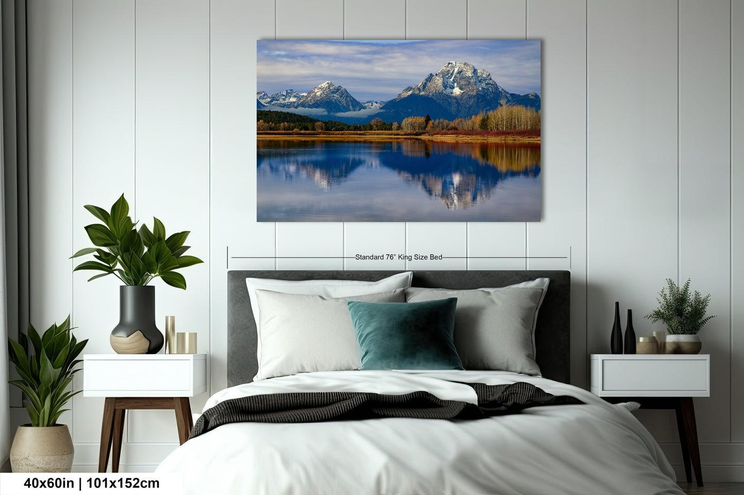 a bedroom with a bed and a painting on the wall