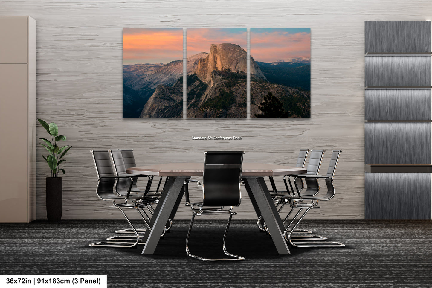 a dining room table with chairs and a mountain in the background