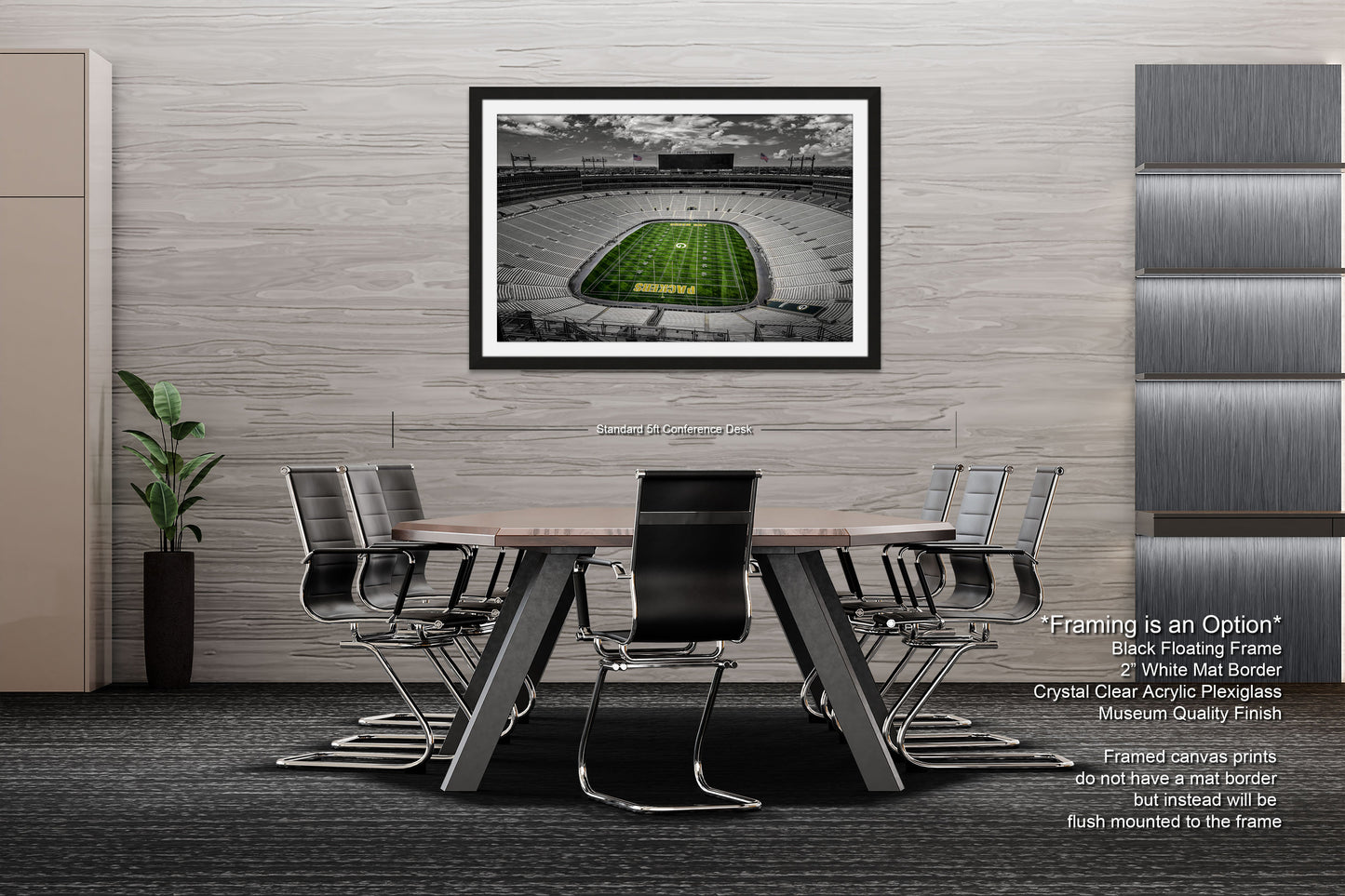 a table with chairs and a picture of a football field