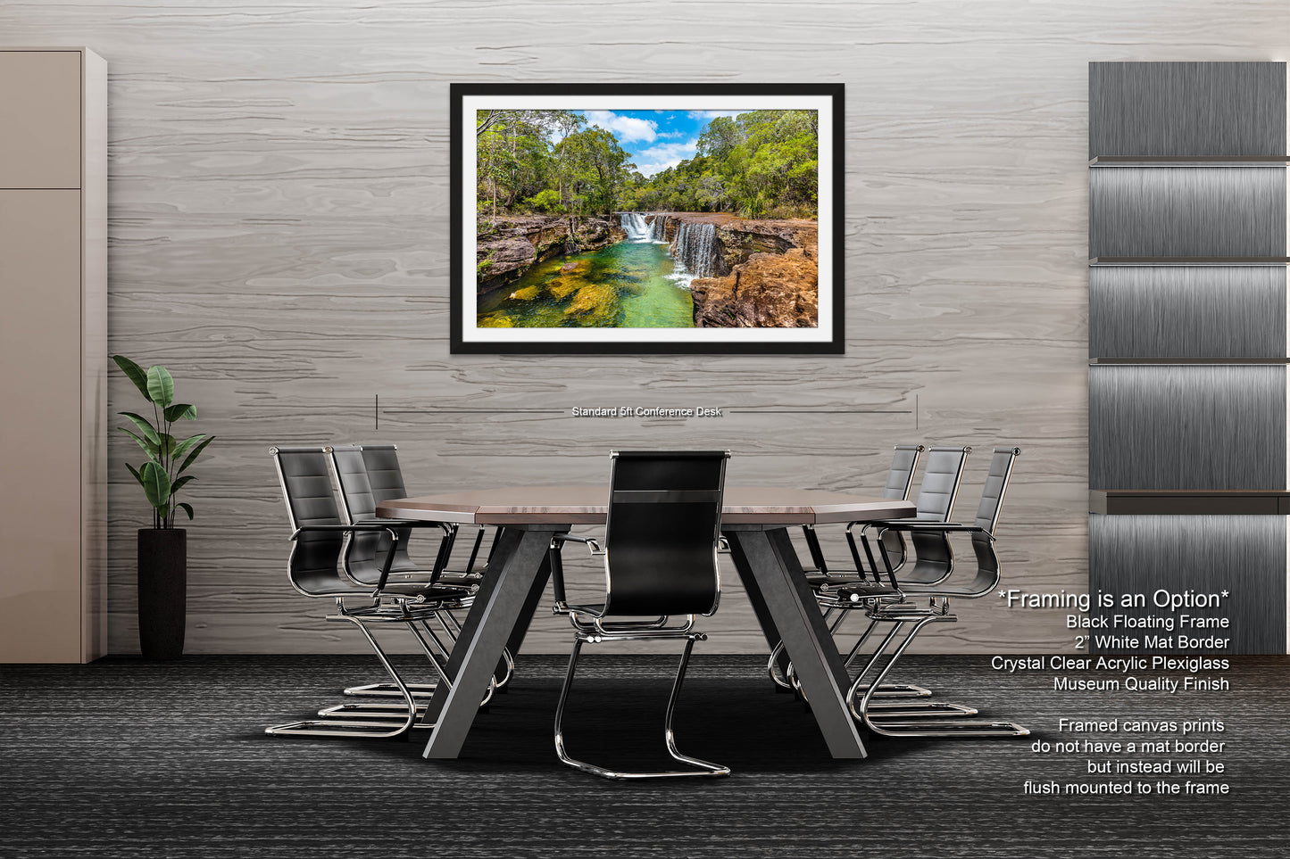 a dining room table with chairs and a painting of a waterfall