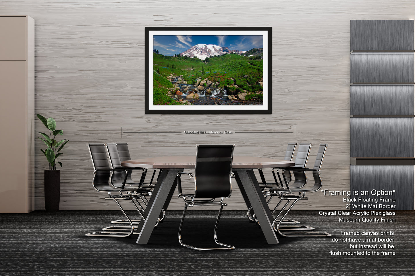 a dining room table with chairs and a picture hanging on the wall