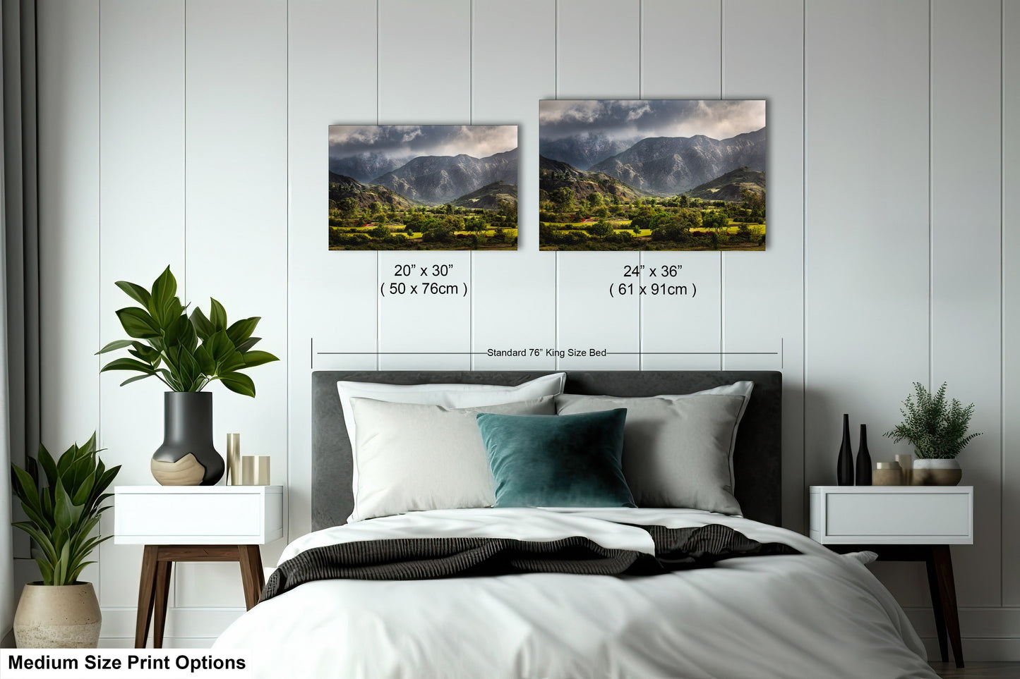 a bedroom with a bed and two pictures on the wall