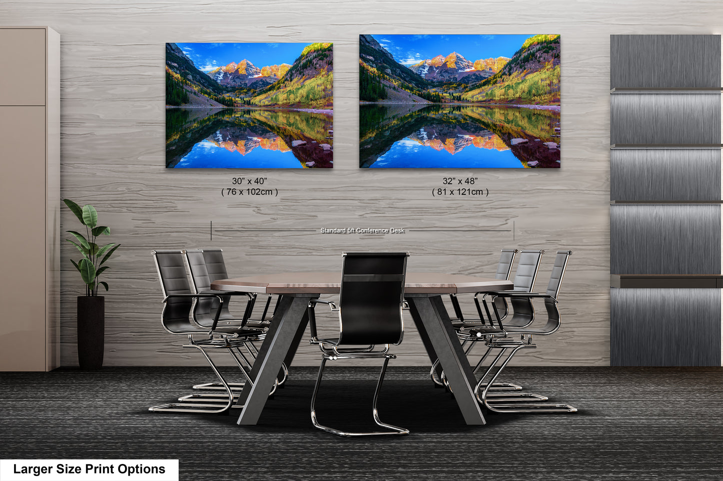 a dining room table with chairs and a painting on the wall