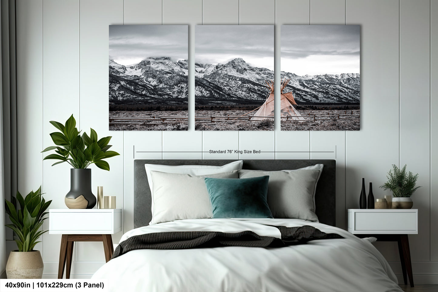 a bedroom with a bed and two pictures on the wall