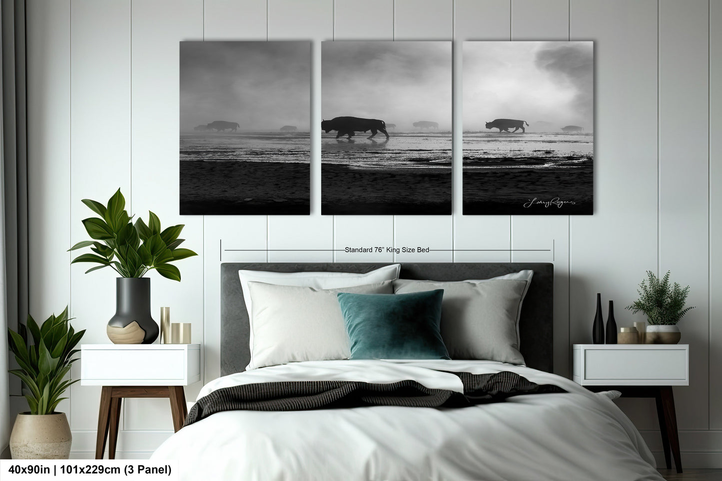 a black and white photo of a bedroom with three elephants