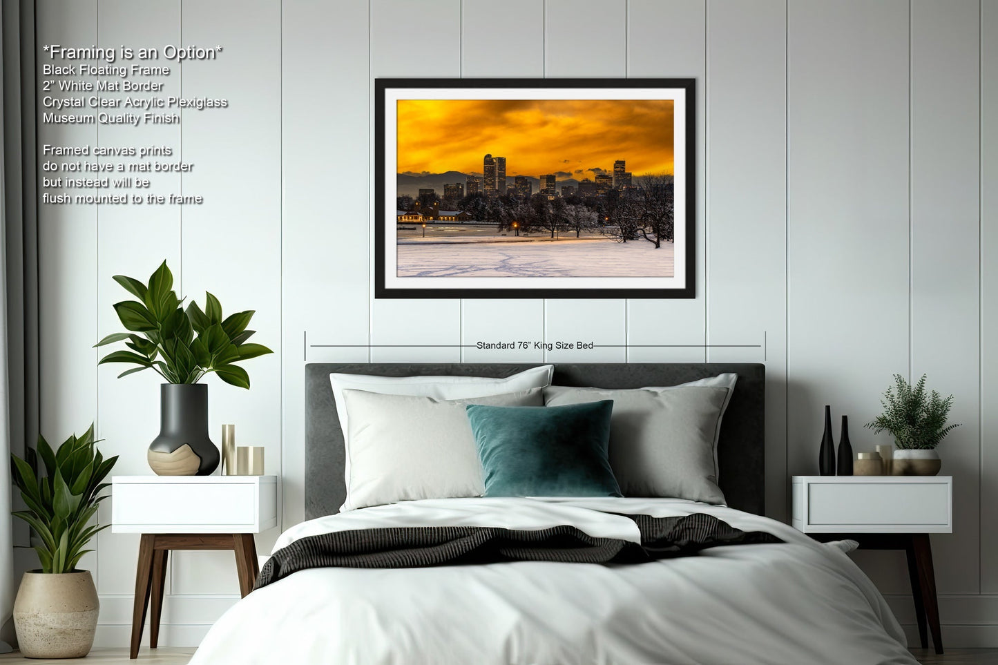 a bedroom with a bed and a picture on the wall