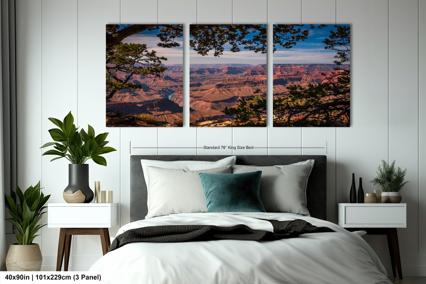 a bedroom with a bed and two pictures on the wall