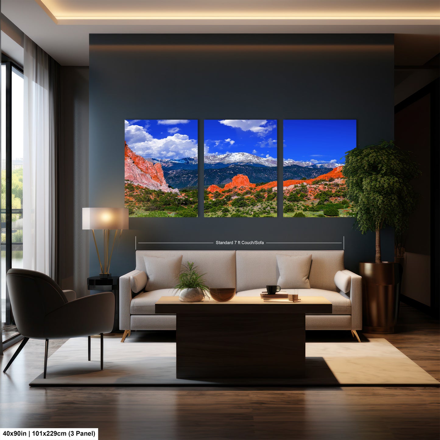 a living room filled with furniture and a painting on the wall