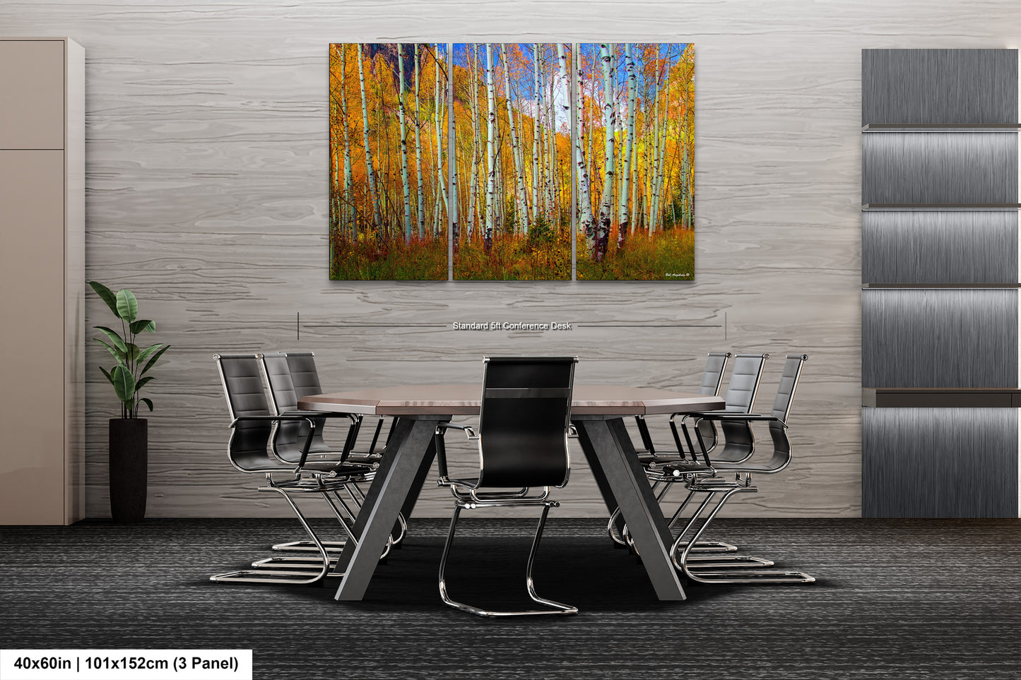 a dining room with a table and chairs and a painting on the wall