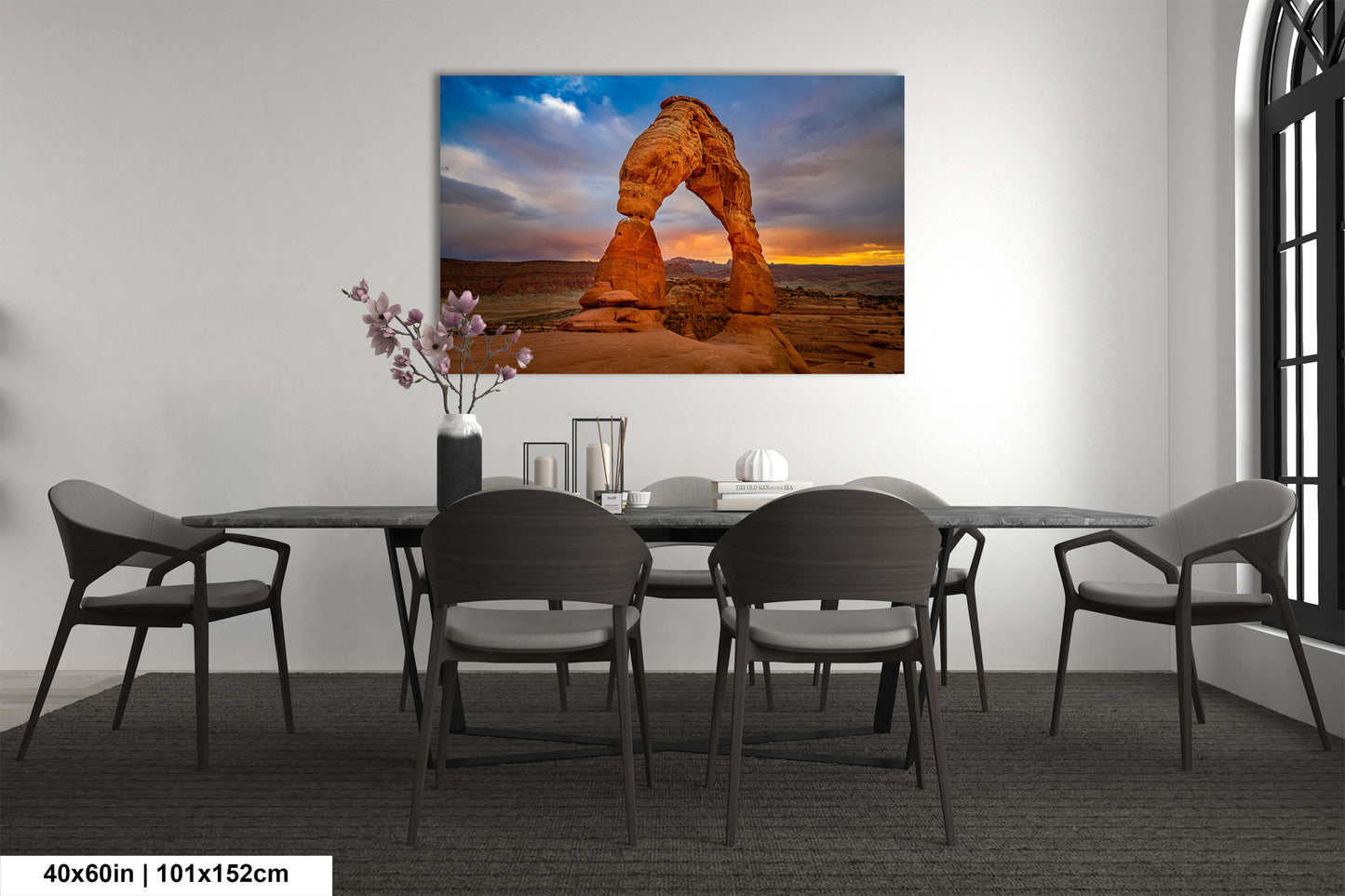 a dining room with a table and chairs