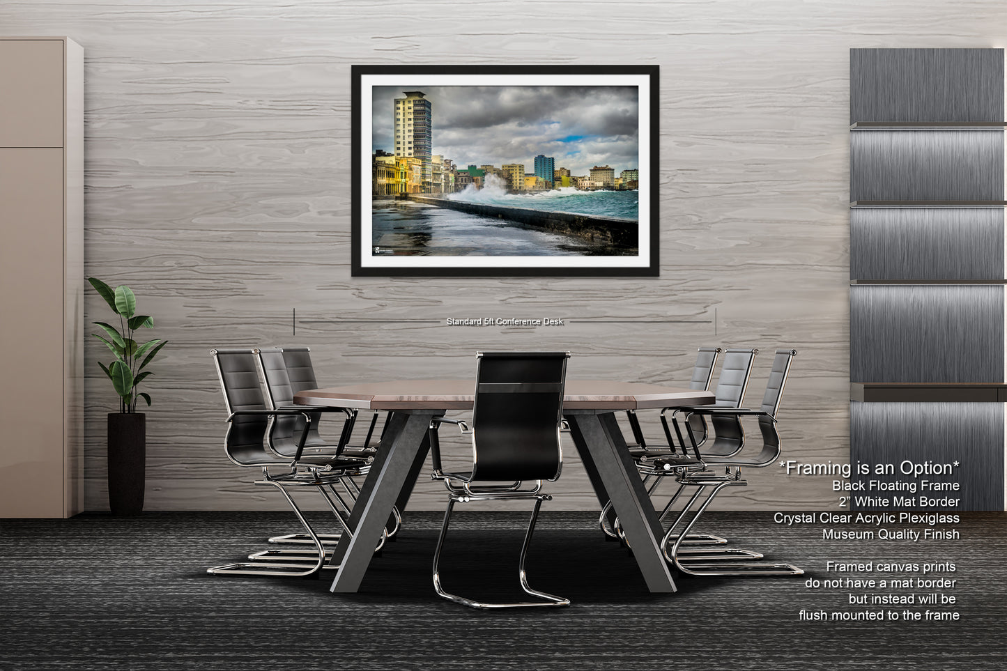 a dining room table with chairs and a picture hanging on the wall