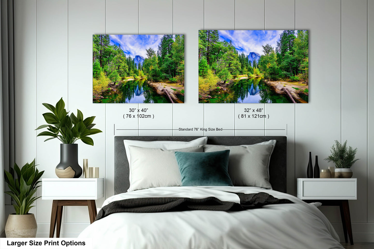 a bed room with two pictures hanging on the wall