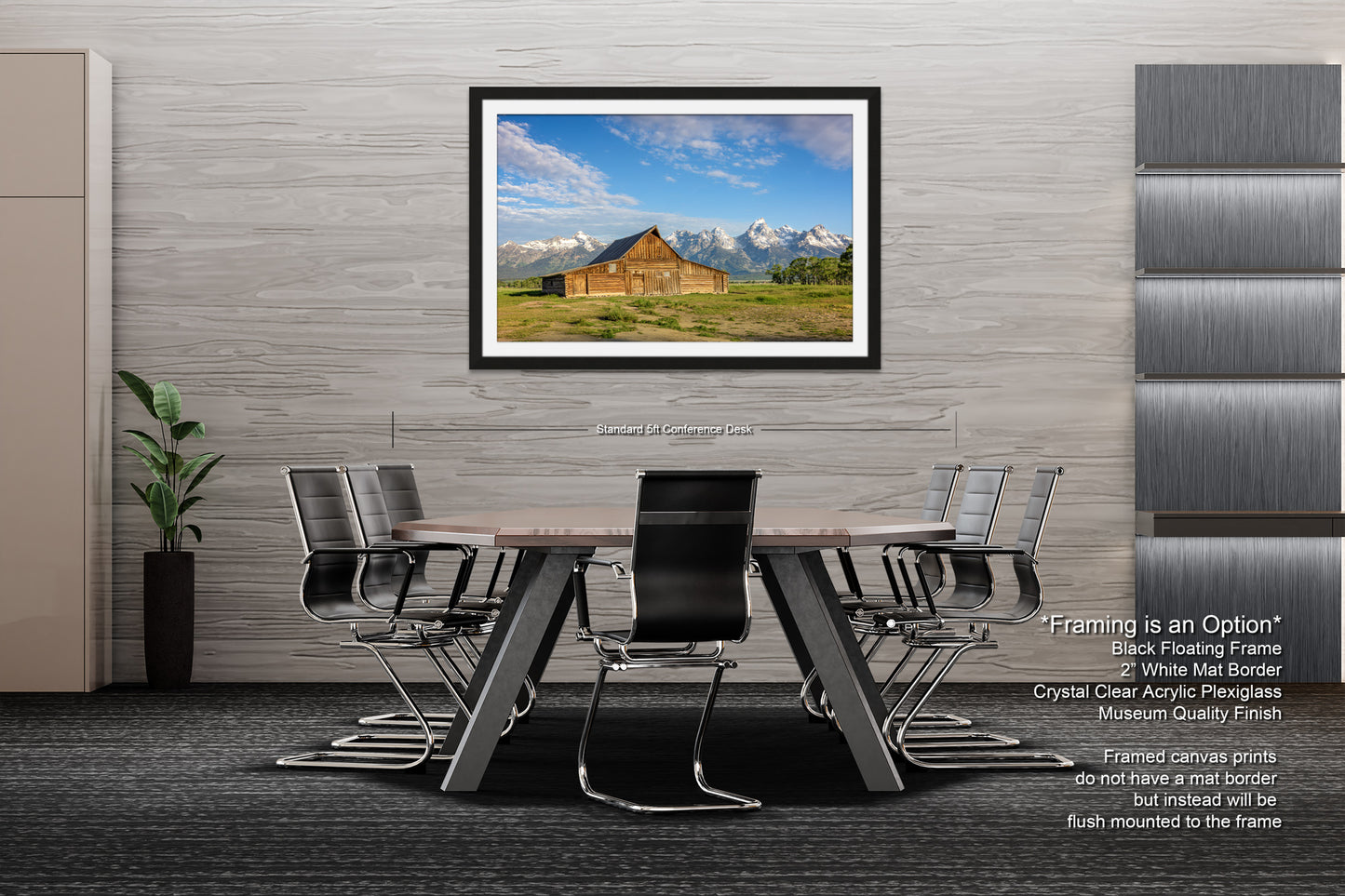 a dining room table with chairs and a picture hanging on the wall