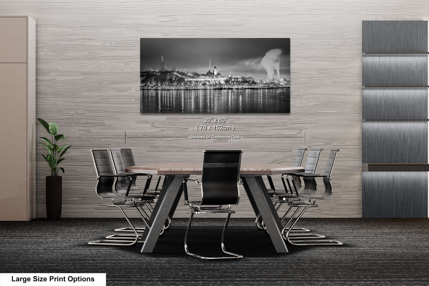 a black and white photo of a table and chairs