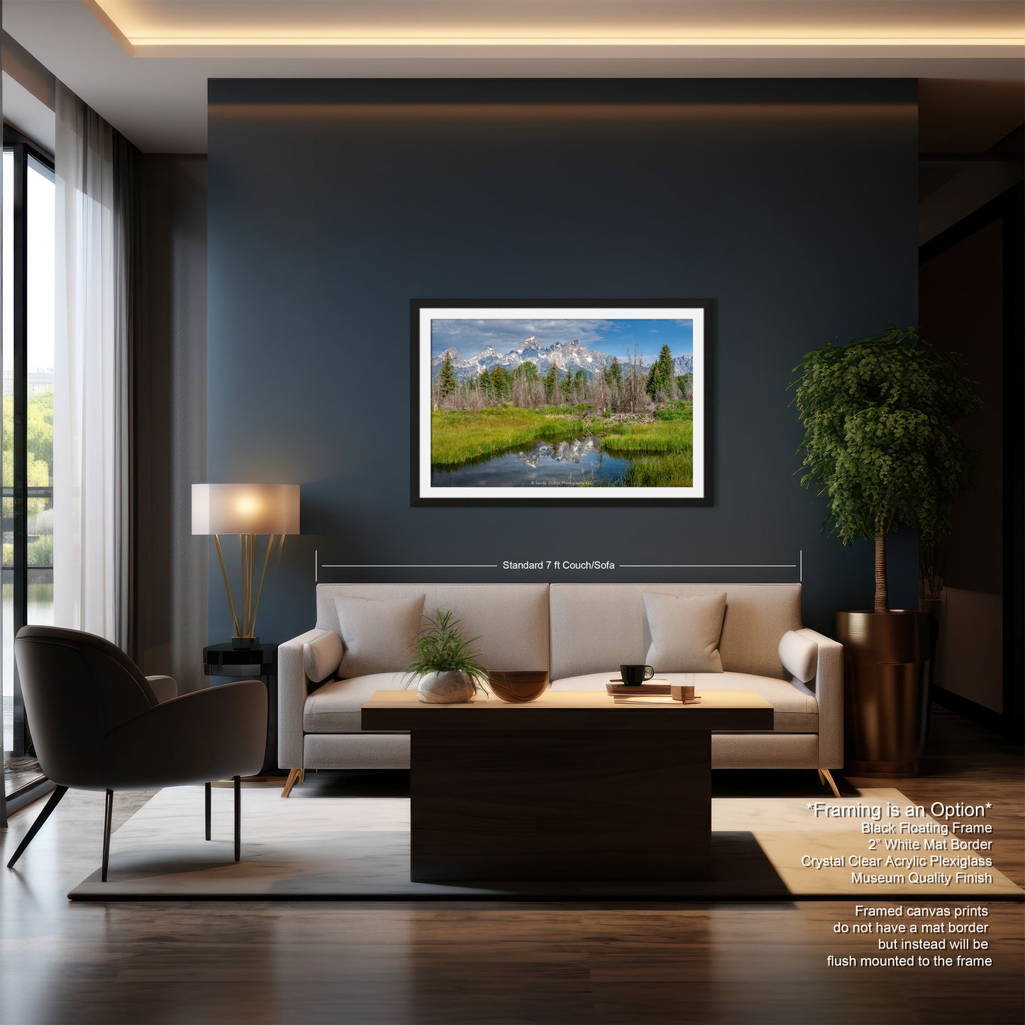 a living room with a couch a chair and a painting on the wall