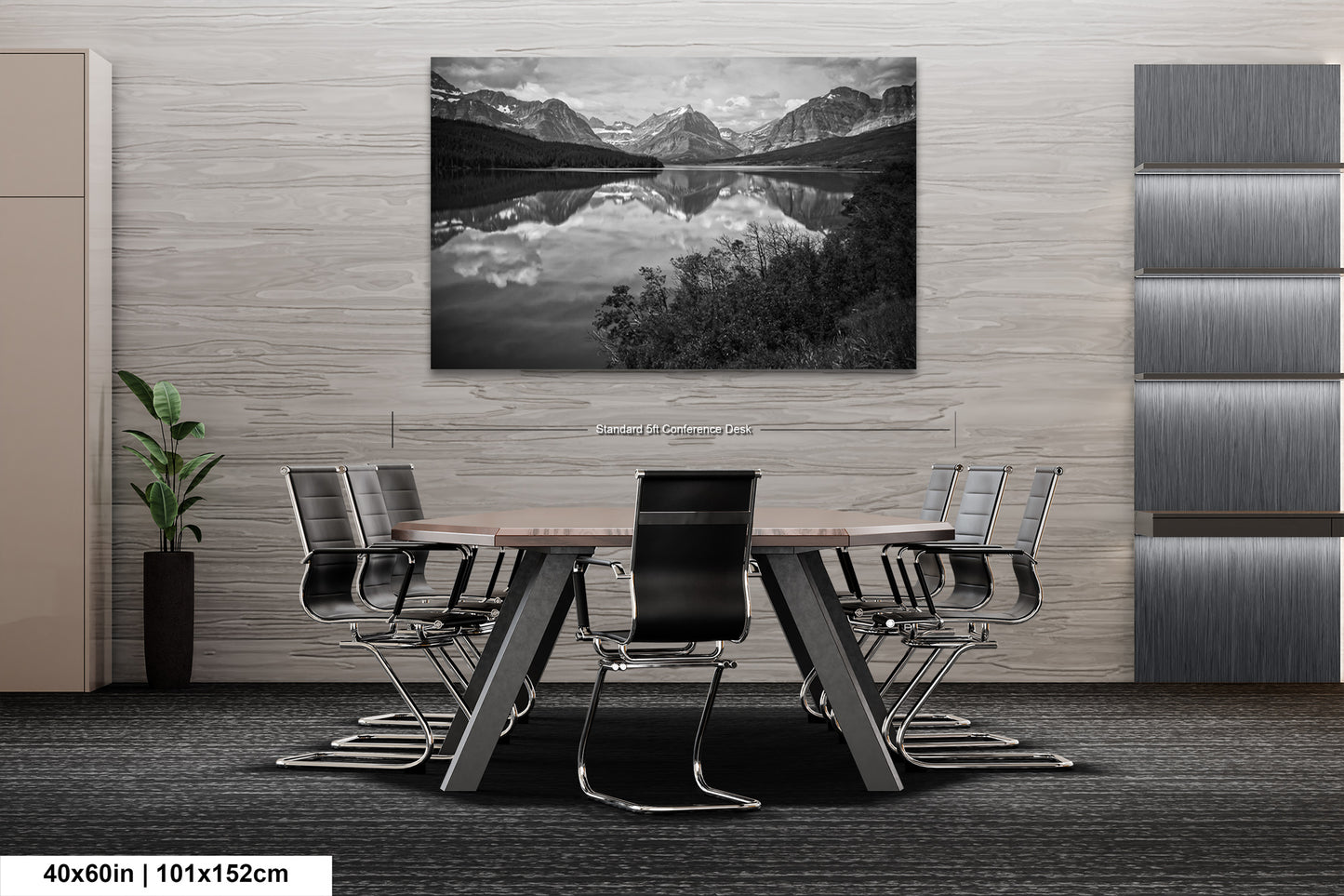 a black and white photo of a table and chairs
