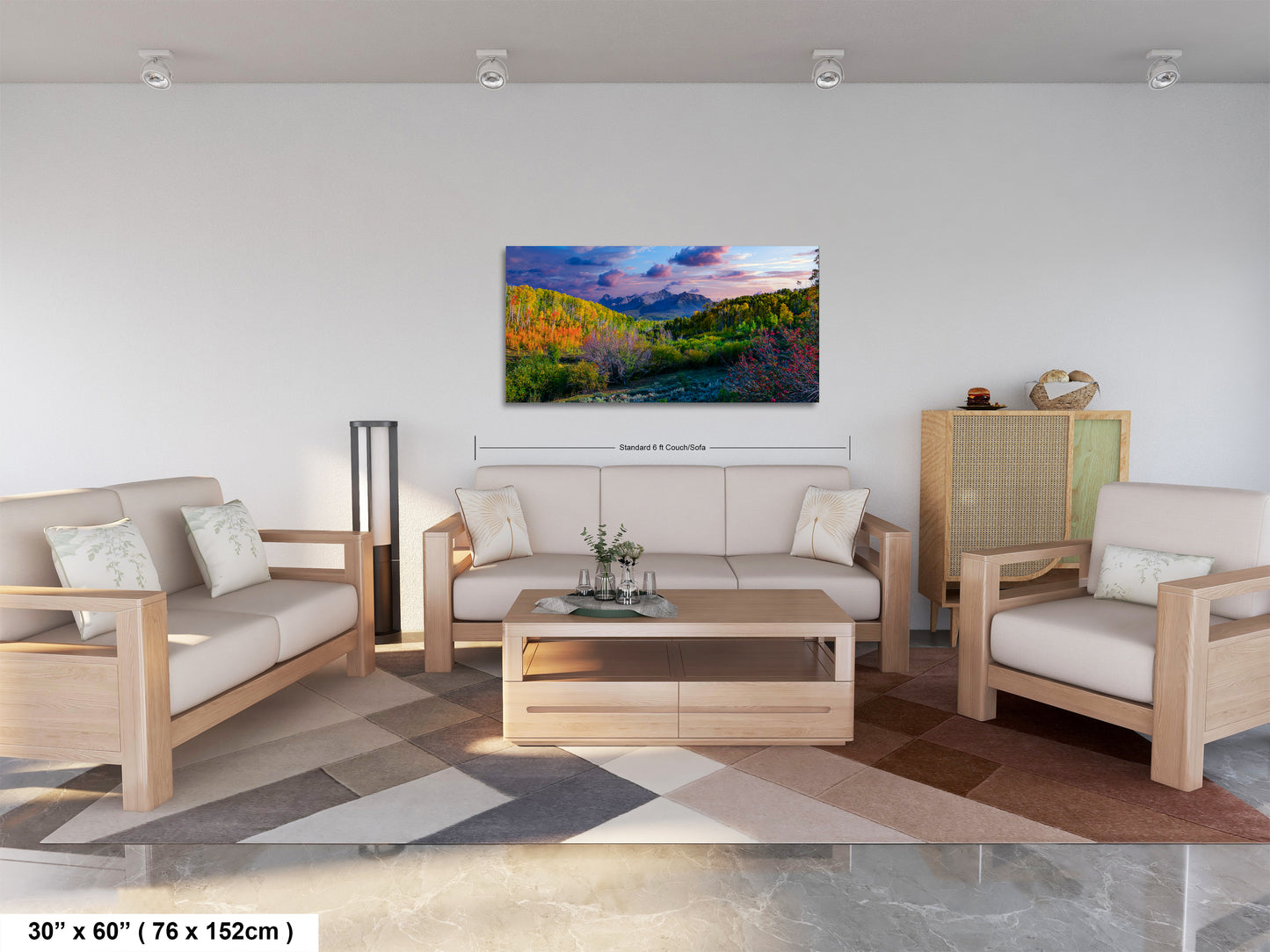 a living room filled with furniture and a painting on the wall
