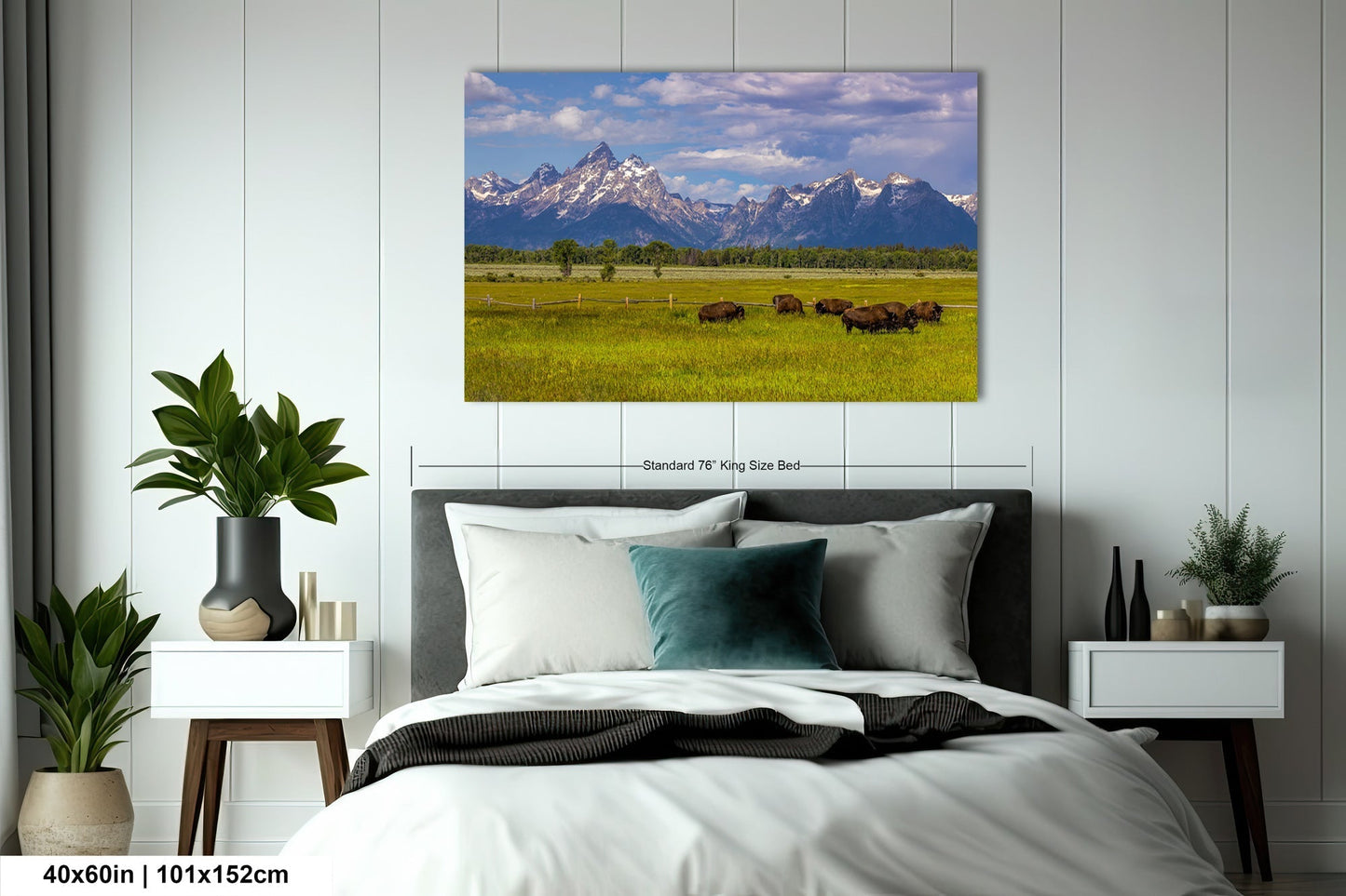 a bedroom with a large bed and a painting on the wall
