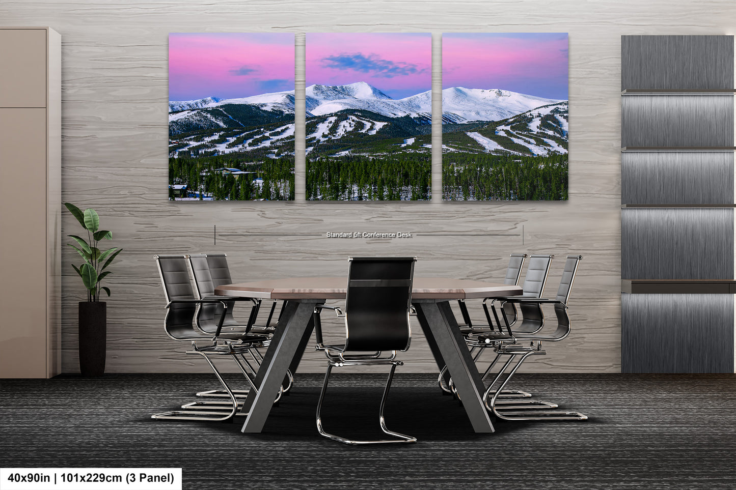 a dining room with a table and chairs with mountains in the background