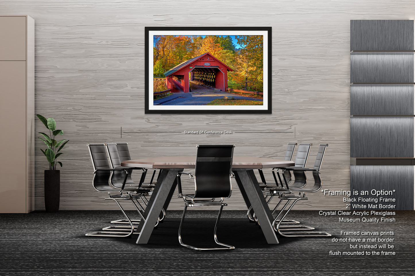 a dining room table with chairs and a picture of a covered bridge