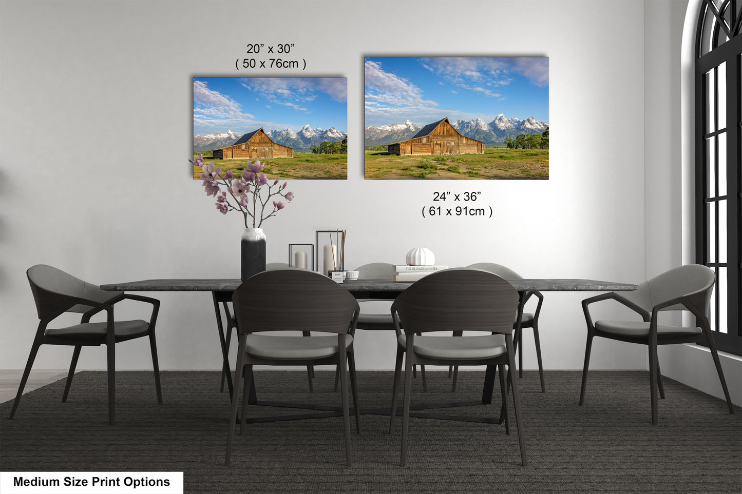 a dining room table with chairs and a vase of flowers