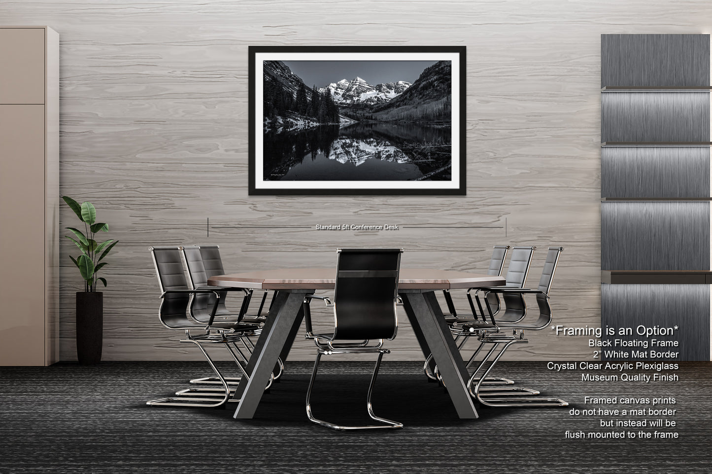 a black and white photo of a table and chairs