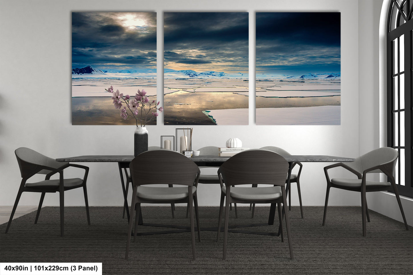 a dining room with a table and chairs