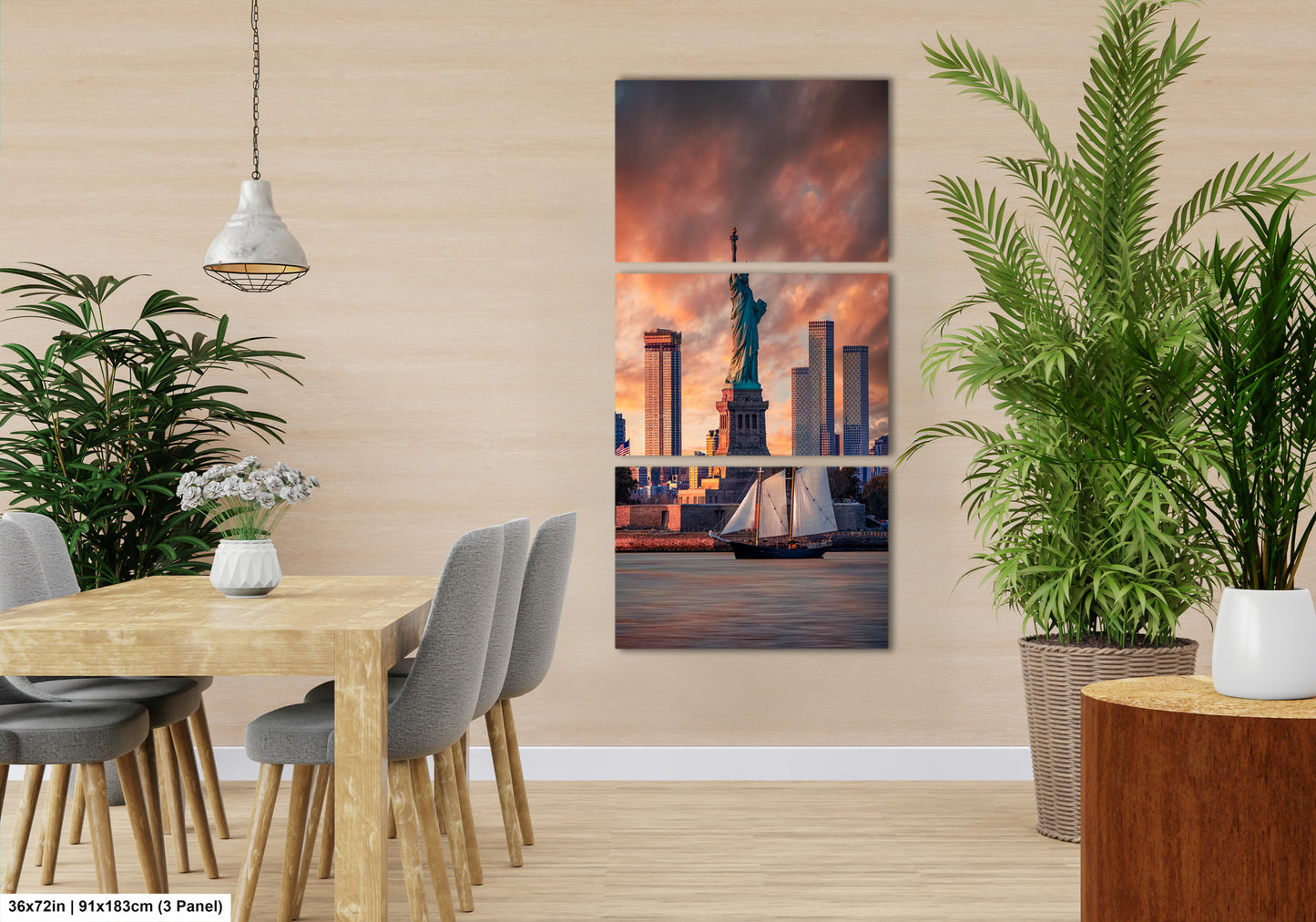 a dining room with a table and chairs and a picture of the statue of liberty