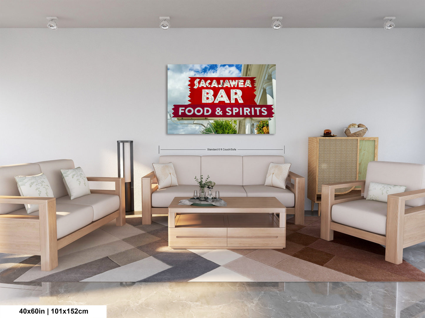 a living room filled with furniture and a painting on the wall