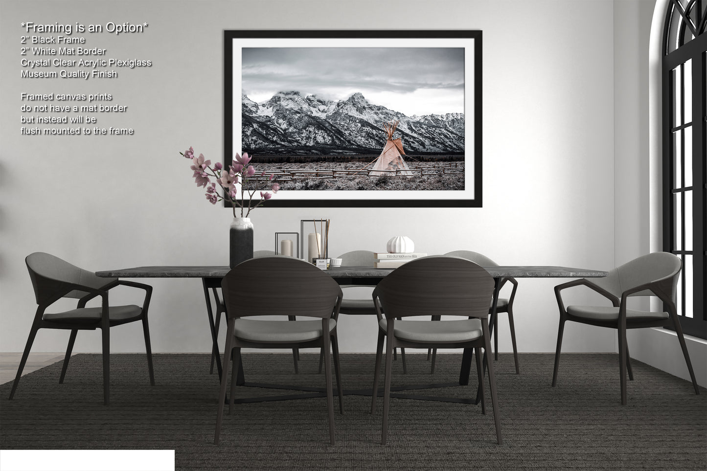 a black and white photo of a dining room table