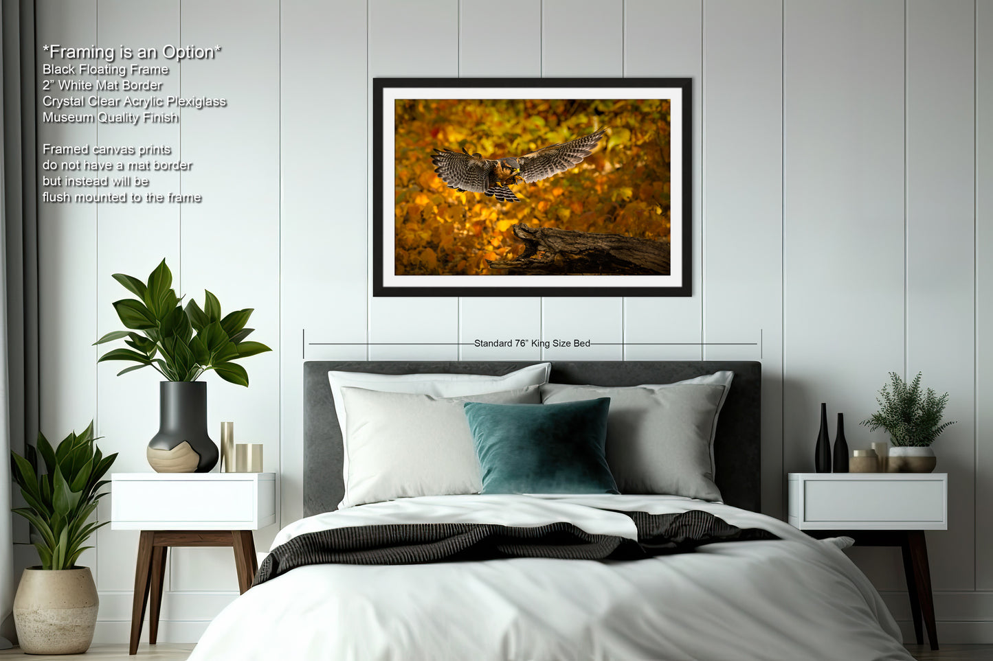 a bedroom with a bed and a picture hanging above it