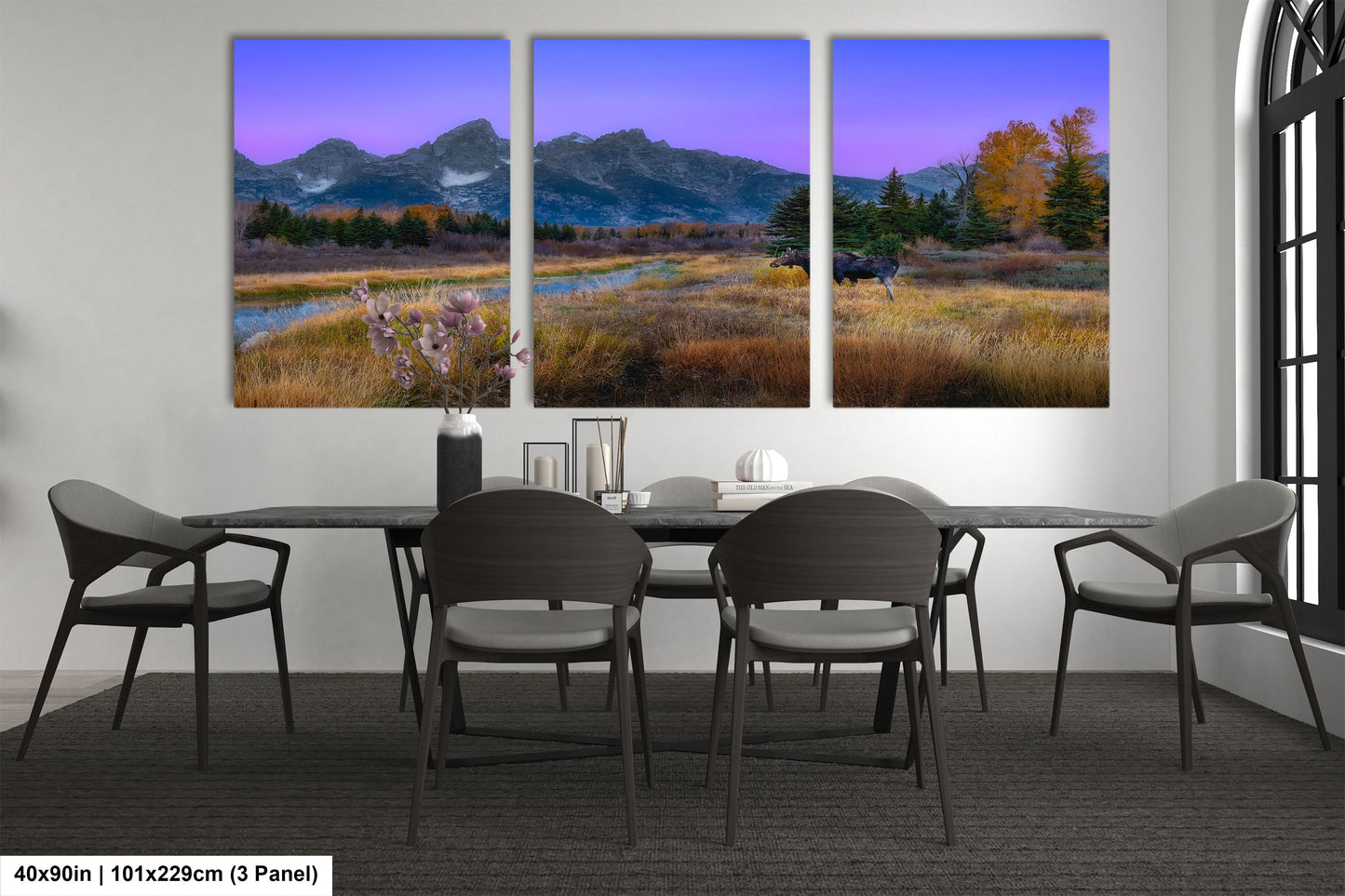 a dining room with a table and chairs