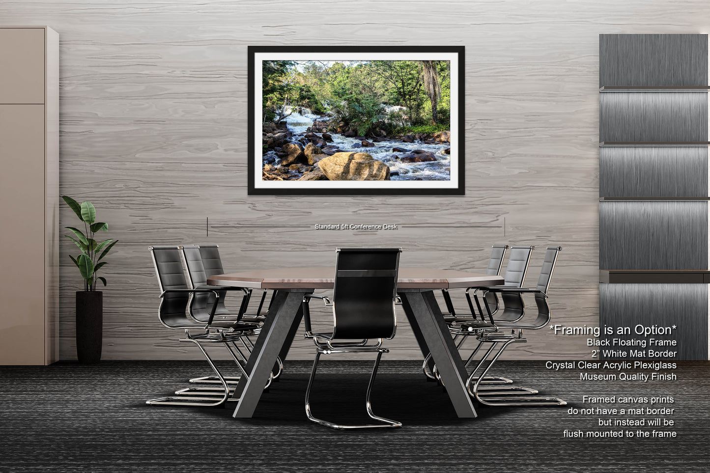 a dining room table with chairs and a picture hanging on the wall