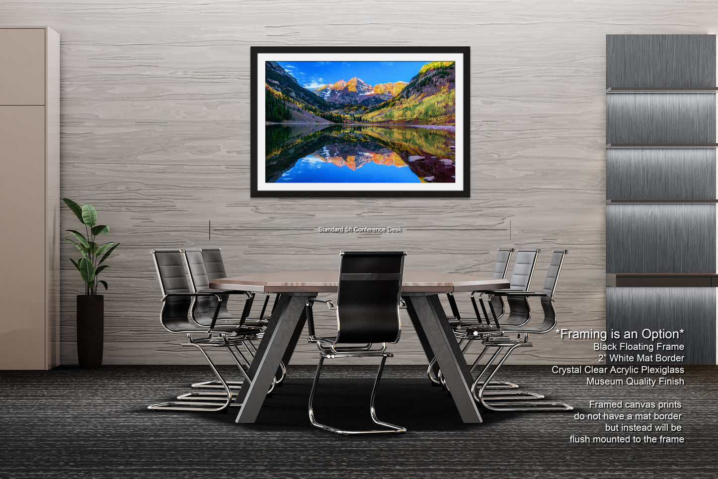 a dining room table with chairs and a painting on the wall