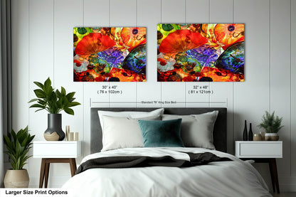 a bedroom with a bed and two paintings on the wall