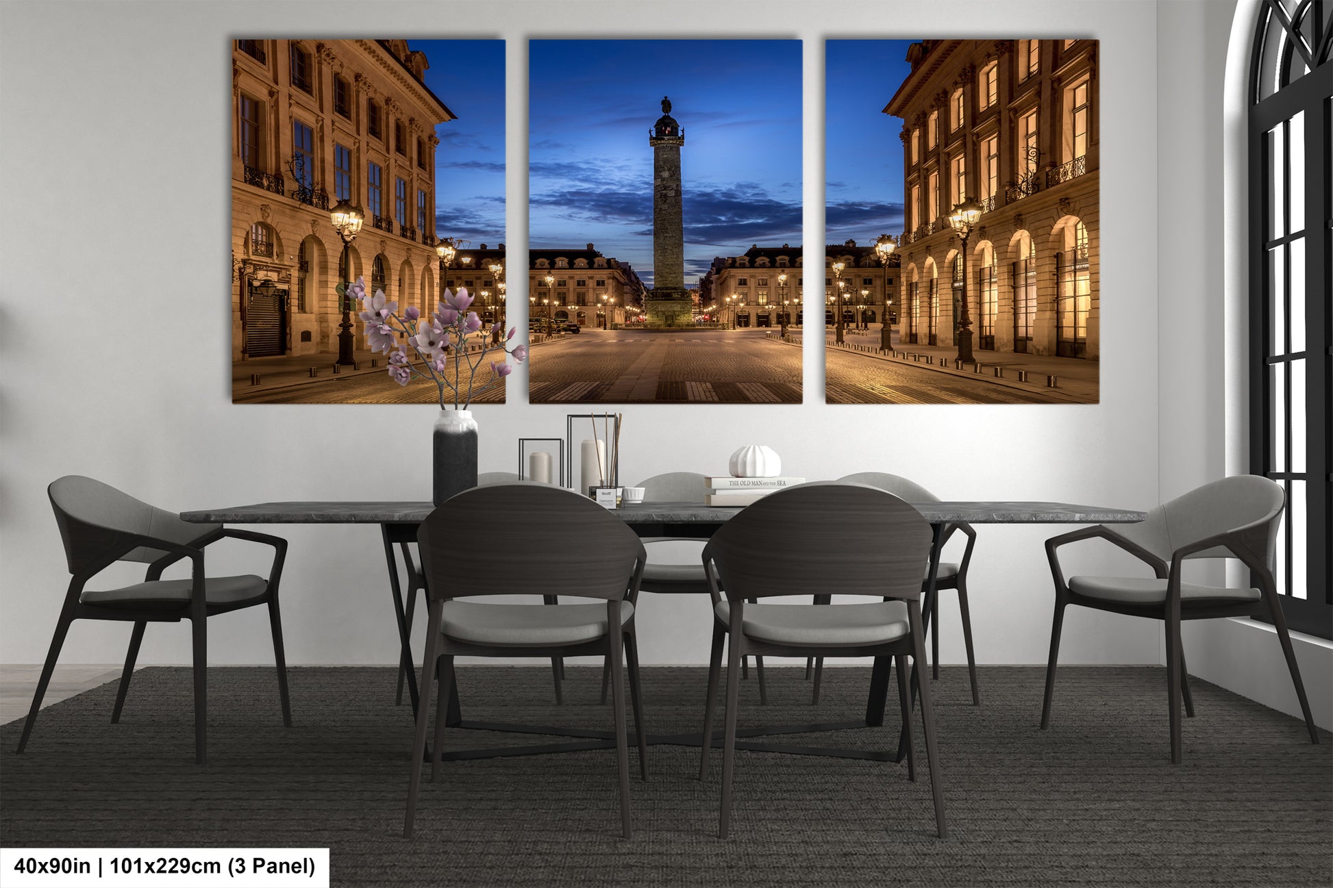 a dining room table with four chairs and a clock tower in the background