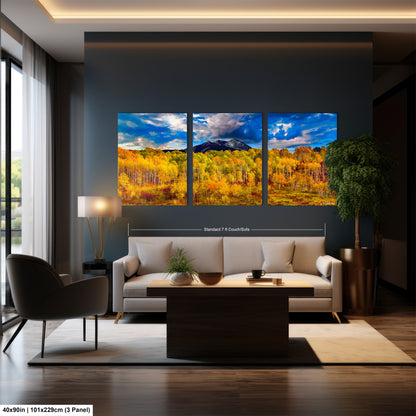 a living room filled with furniture and a painting on the wall