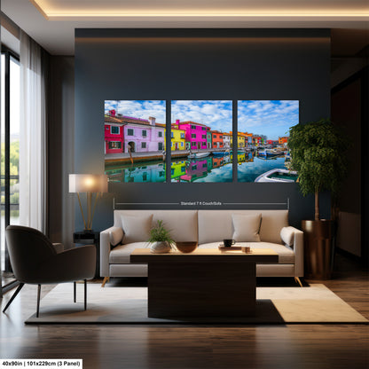 a living room filled with furniture and a painting on the wall