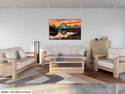 a living room filled with furniture and a painting on the wall