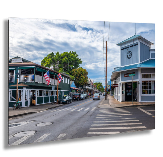 a city street with a clock tower in the background