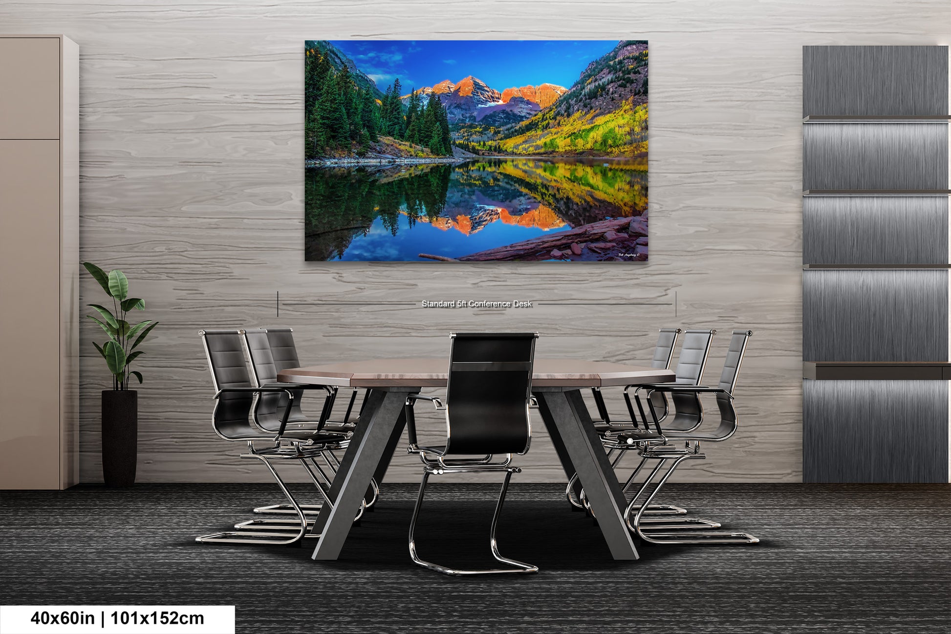 a painting of a mountain lake in the middle of a room