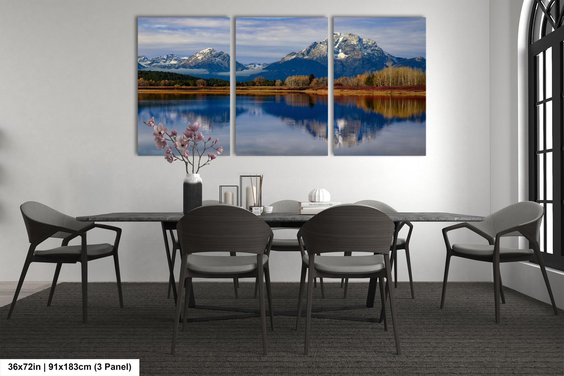 a dining room with a table and chairs